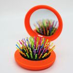 Cepillo-Para-Peinar-Neumatico-Mini-Con-Espejo-1-Und